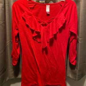 Super. It’s dressy 3 quarter sleeve shirt.